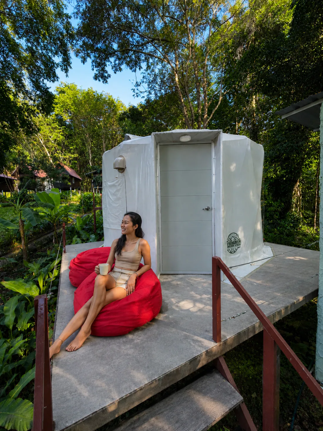 Low seating and relaxation area inside a Glamping Yurt at Vanara Retreat